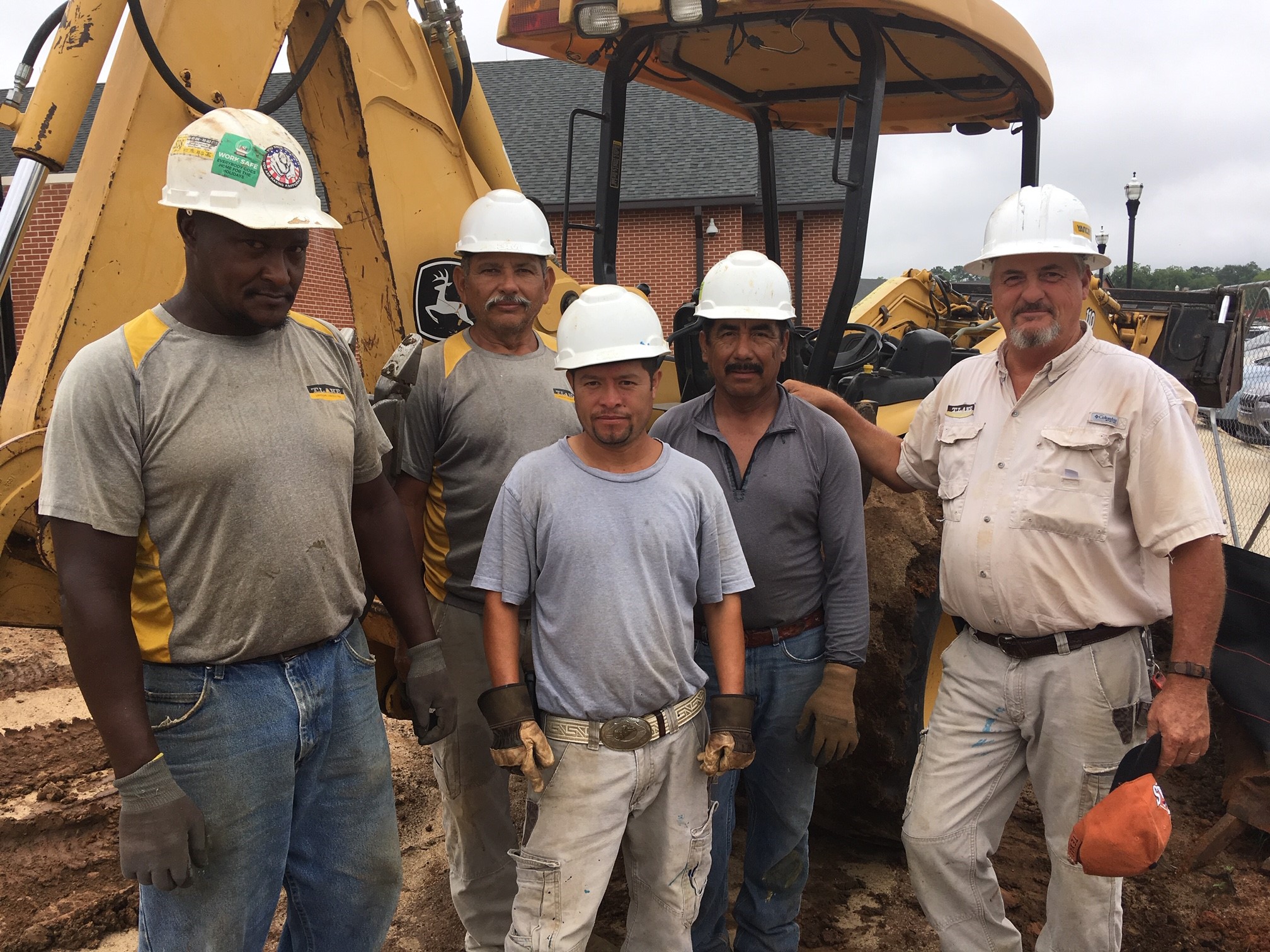 Members of this T lake crew are proud to have a landscaping career